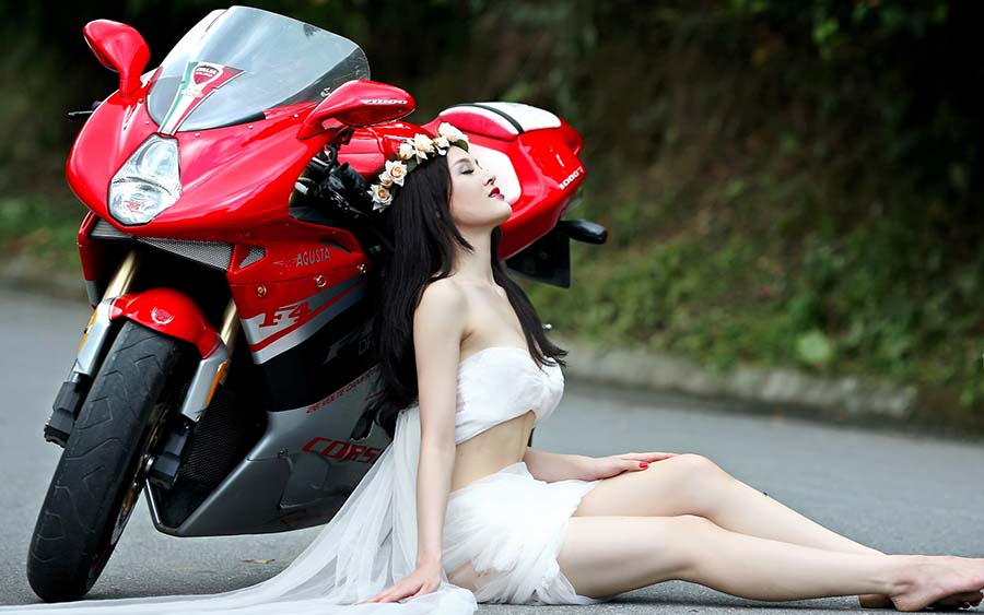 Beautiful girls and motorcycles in Padang